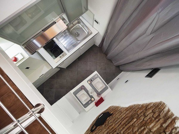 the-house-which-covers-all-of-75-square-feet-is-less-than-an-armspan-wide-and-13-feet-long-after-pierazzi-and-his-wife-had-a-child-they-starting-renting-out-the-space-to-friends-and-acquaintances