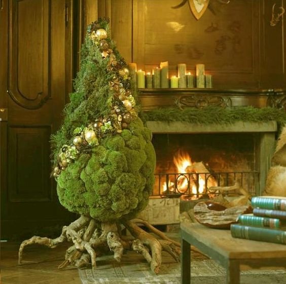 AMAZING Christmas Tree picture I stumbled onto via pinterest. Moss, roots, and pine~simple, rustic, and elegant all at the same time. This would be fun to make.: